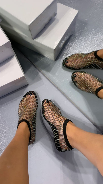 Scarpe eleganti e lucide