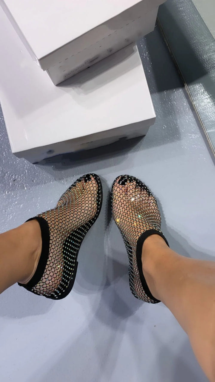 Scarpe eleganti e lucide